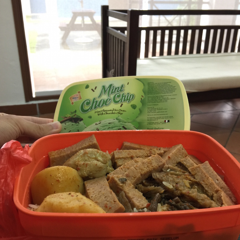 Honest & green lunch packed by mum in a used ice cream tub...