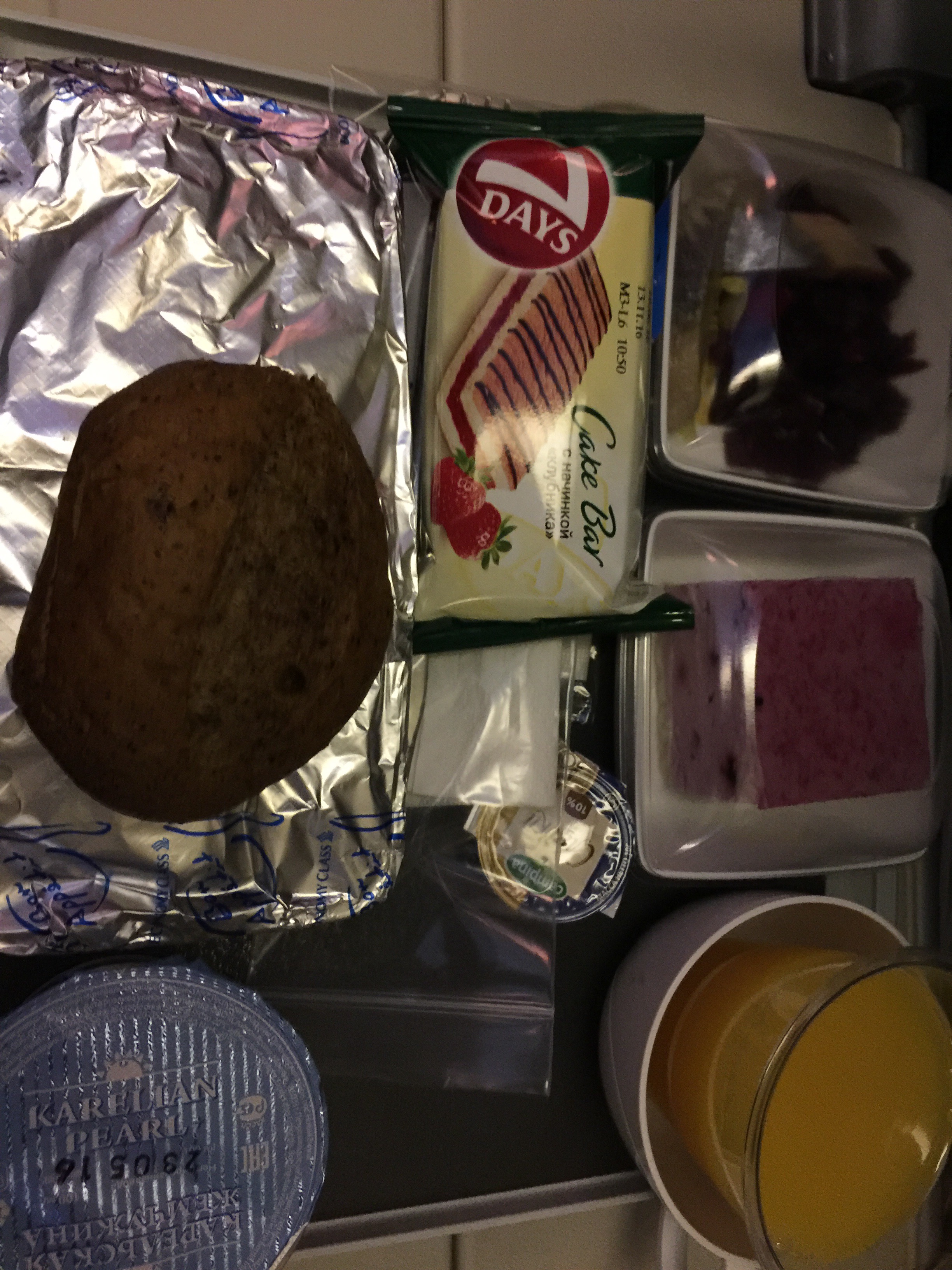 Many meals on plane! Russian cakes!!!