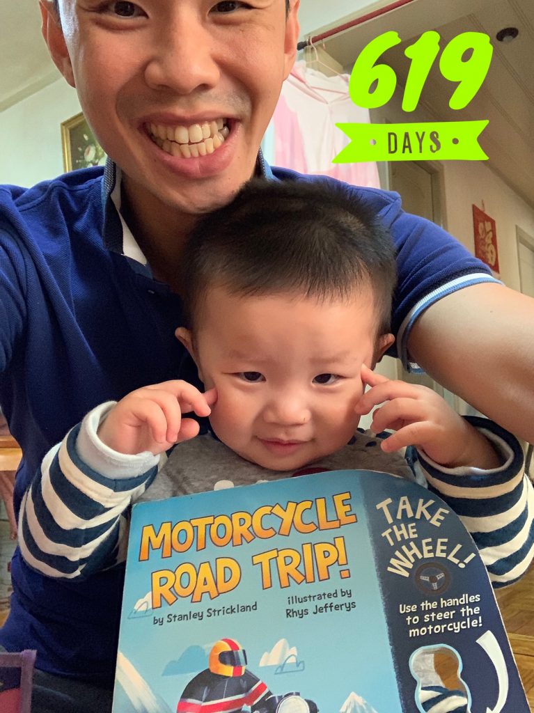 Lucas Day 619: with his favourite motorcycle role playing book!