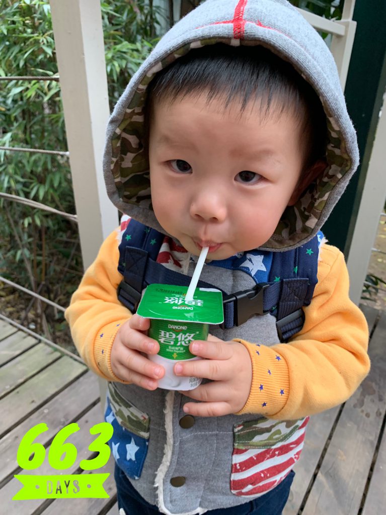 Lucas Day 663, drinking his favourite yogurt after school!