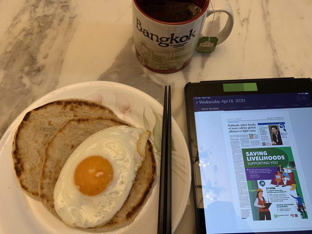 Enjoying breakfast and the papers!