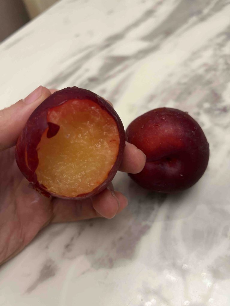 I dont know the name of this fruit but I quite like it... is it Plum?