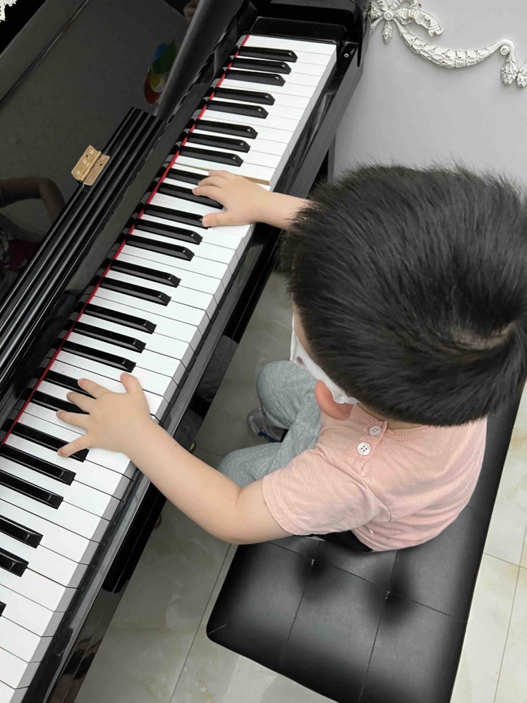 Playing the Piano! really just playing it like a toy, not a song! =p