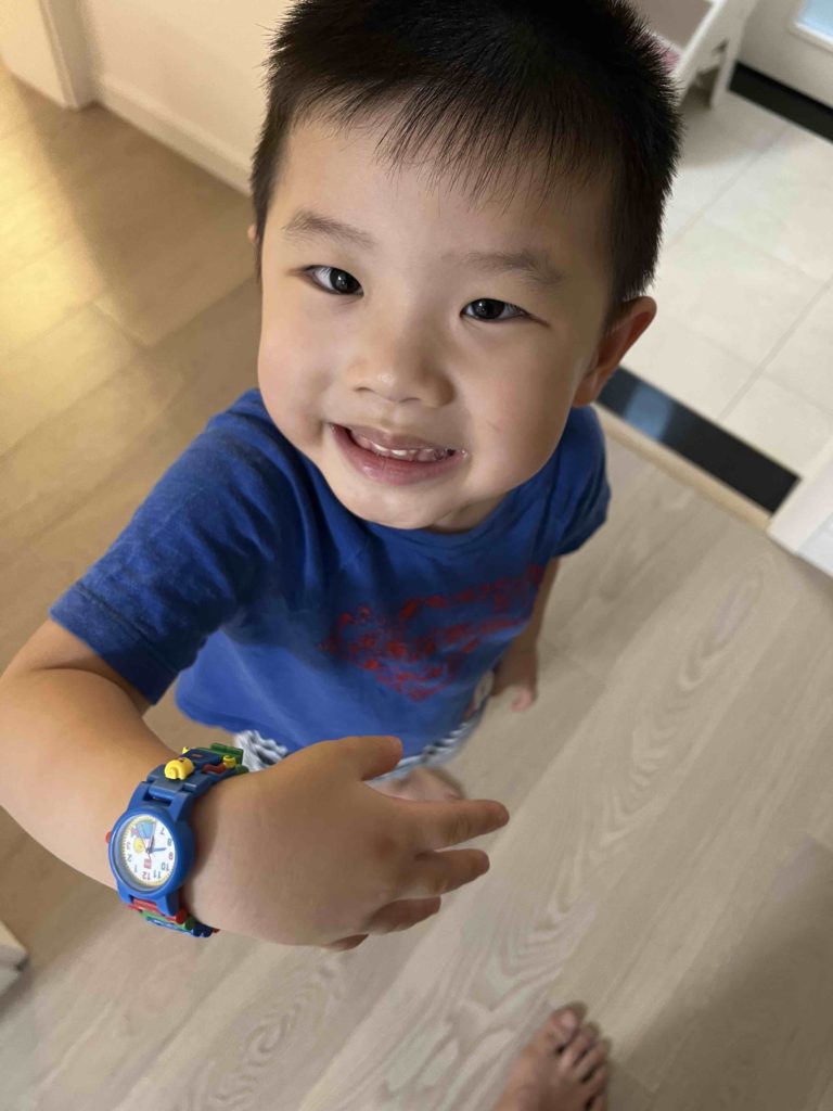 Happy to get his Lego watch!