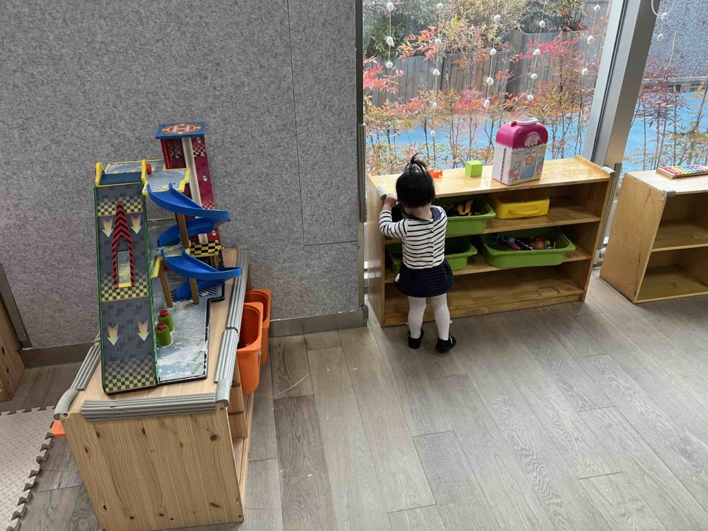 No crying (yet) while exploring the toys in the classroom!
