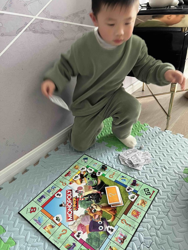 Enjoying his Monopoly even when sick!
