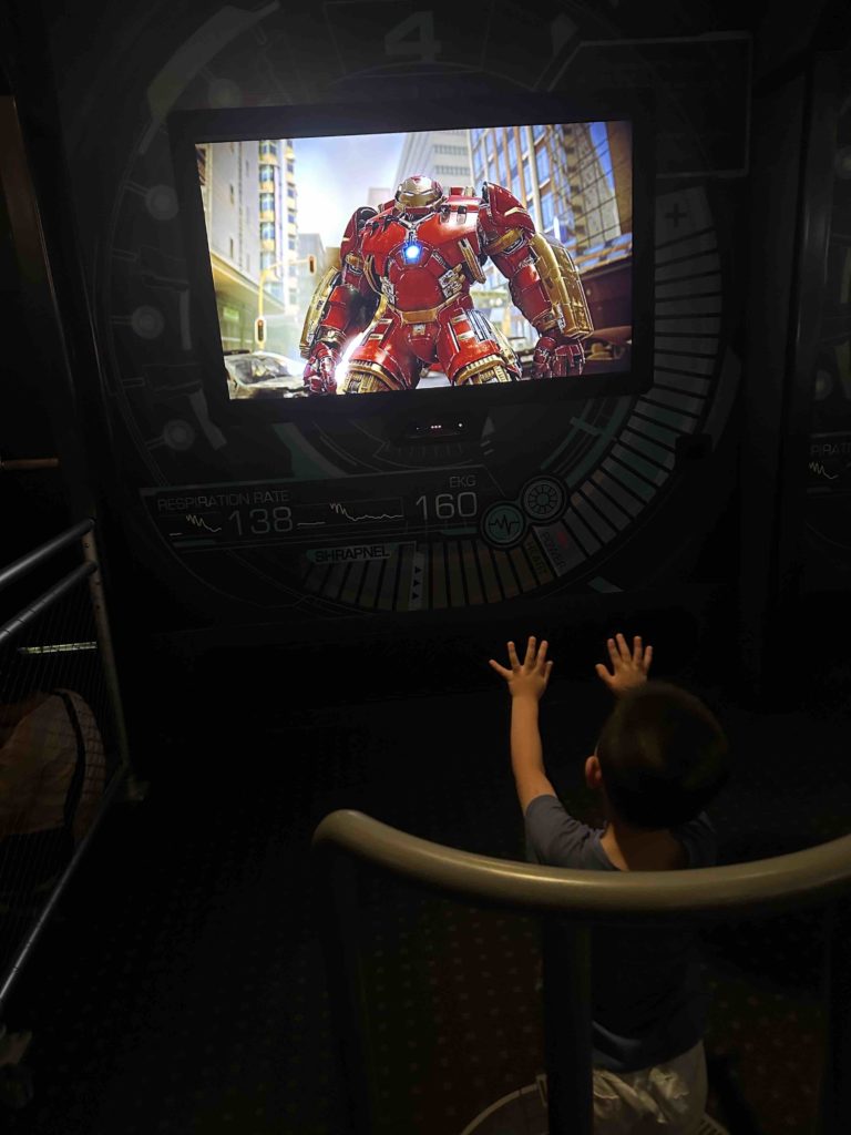 Playing his favourite Iron man game at Marvel!