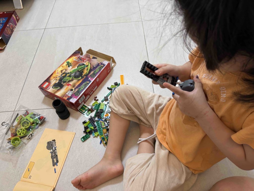 Lucky got stock of brand new lego to keep kids occupied.