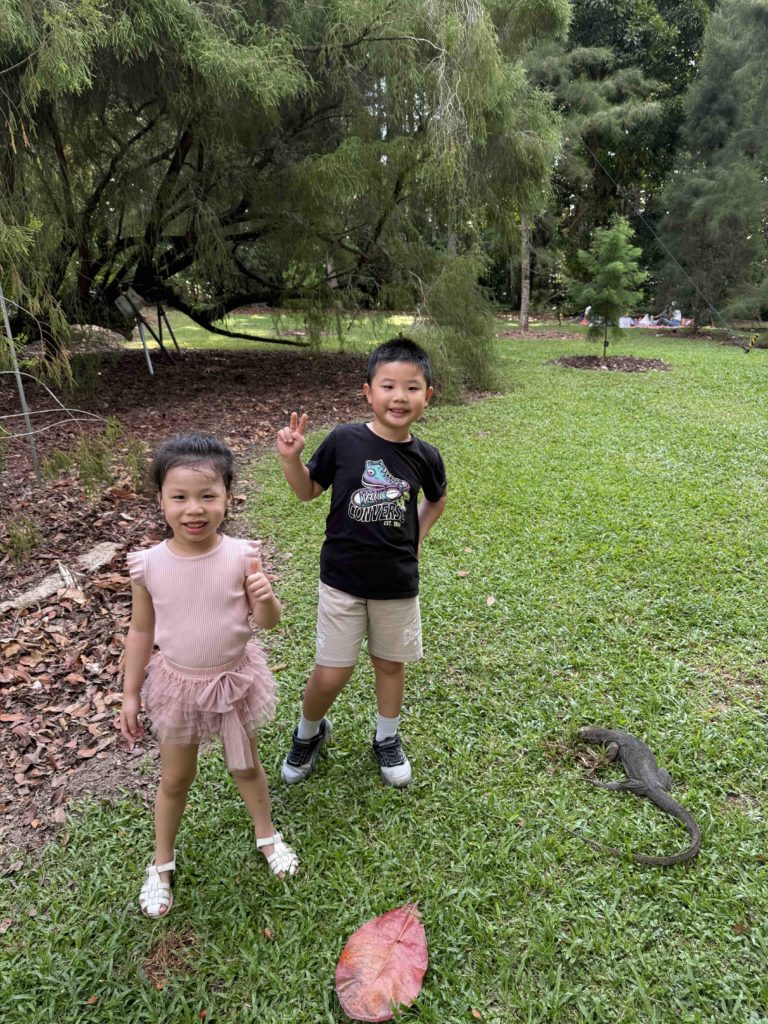 Posing beside big monitor lizard!