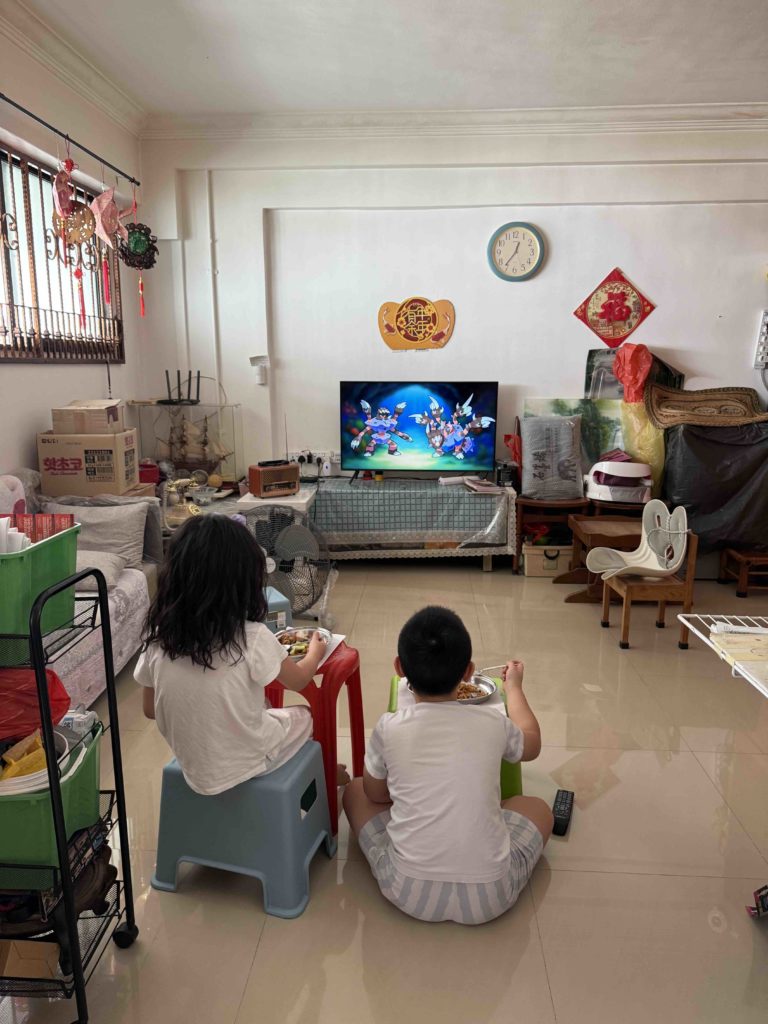 Watching TV and eating lunch at 爷爷奶奶 house...