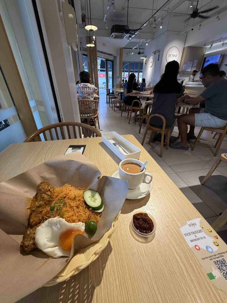 The Toast, trying their famous Mee Siam with rendang chicken!