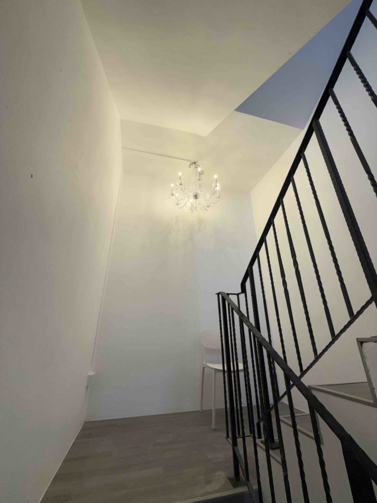 Chandelier is up! Finally found the right size bulbs!