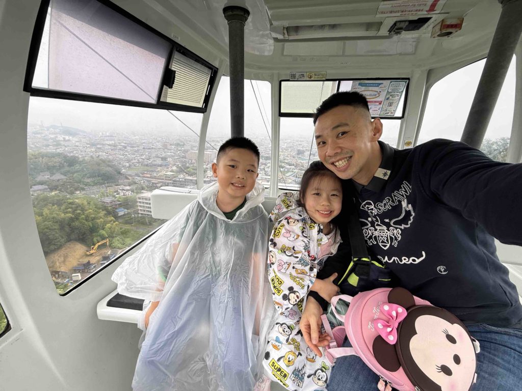 On the cable car to Pokemon Land!