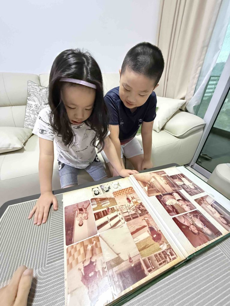 Showing them old photos...