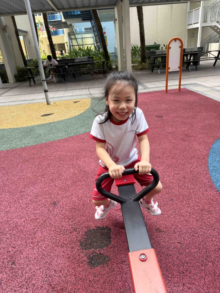 She loves the see-saw best...