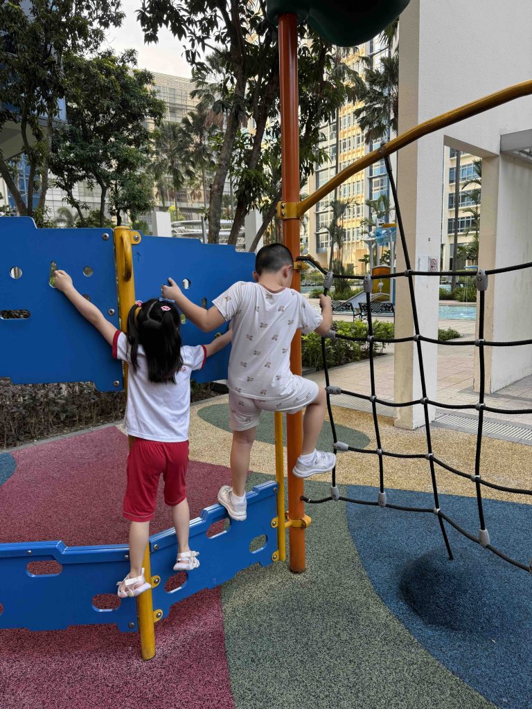 Playing the dry playground, eyeing the wet playground...